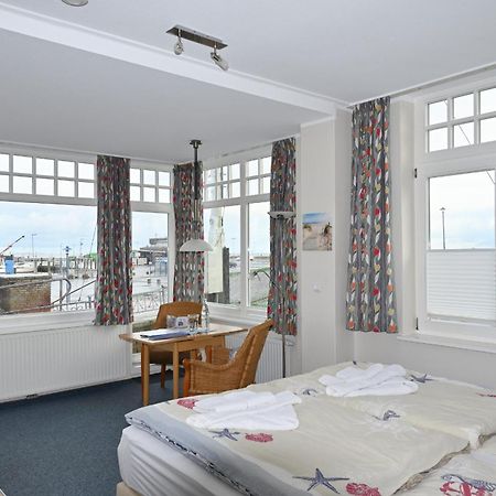 Cafe Stoermhuus Apartment Нойхарлингерзийл Екстериор снимка